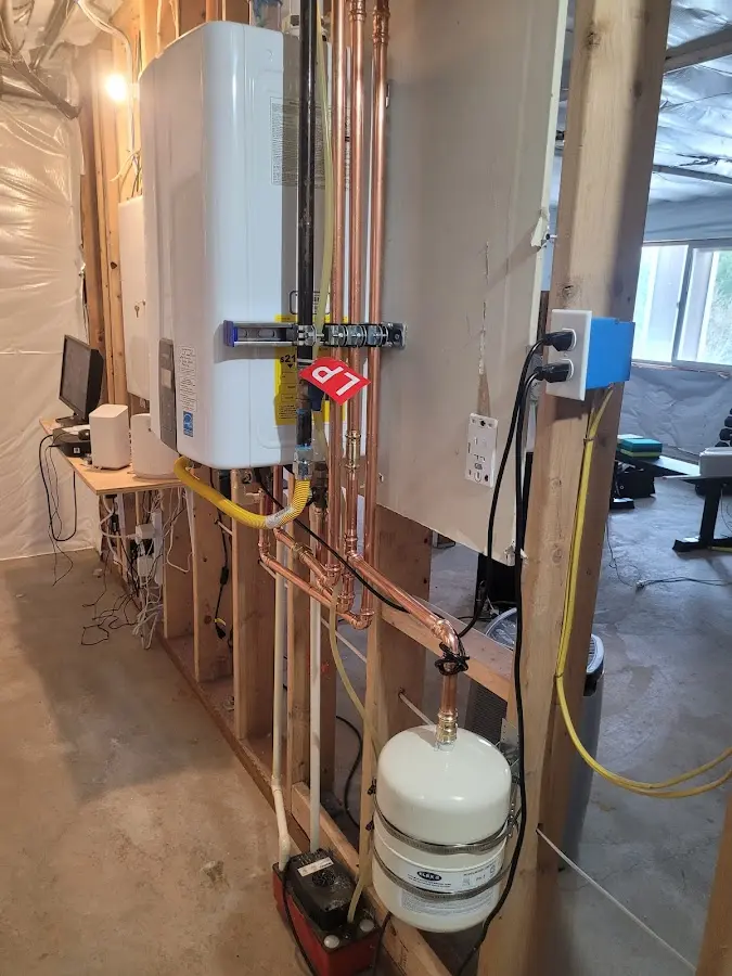 Licensed plumber repairing a kitchen sink in Beebe