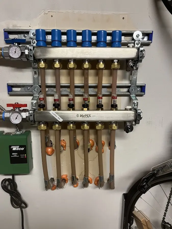 Plumber performing Water Heater Repair at a residential property in Beebe